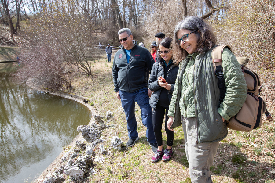 Linda Lombardo, right, leads a group on a “ Forest Bathing Walk” at the Sands Point Preserve in Sands Point, March 18, 2023. Photograph by J. Conrad Williams